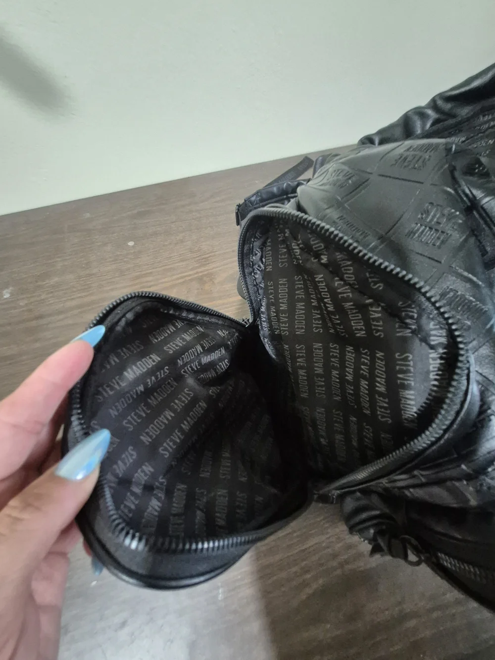 Steve Madden Black Embossed Leather Backpack